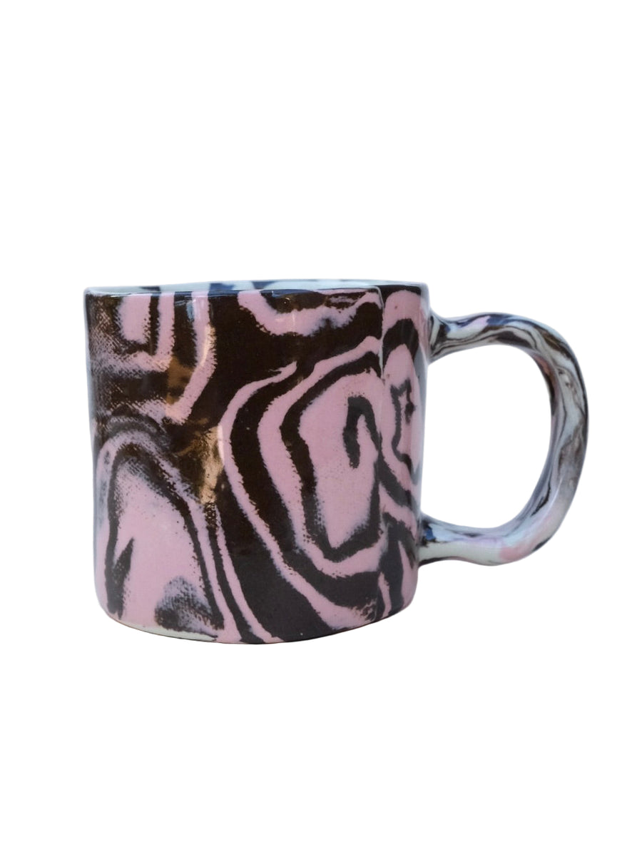Nerikomi Marbled ceramic mug with pink and brown patterns on a white background